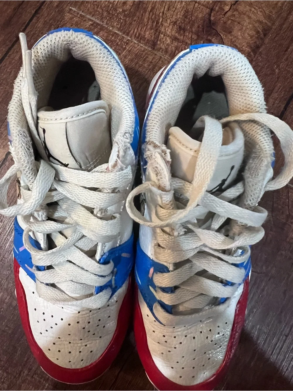 Nike Kids White Sneakers with Red & Blue Accents
